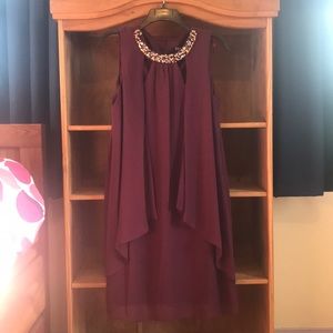 Beautiful plum dress perfect for any party
